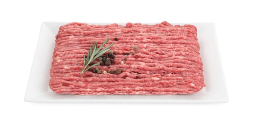 Photo of Raw ground meat, rosemary and peppercorns isolated on white