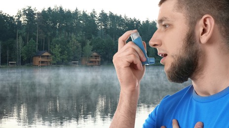 Image of Man using asthma inhaler near lake. Emergency first aid during outdoor recreation