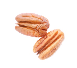 Shelled pecan nuts on white background, top view