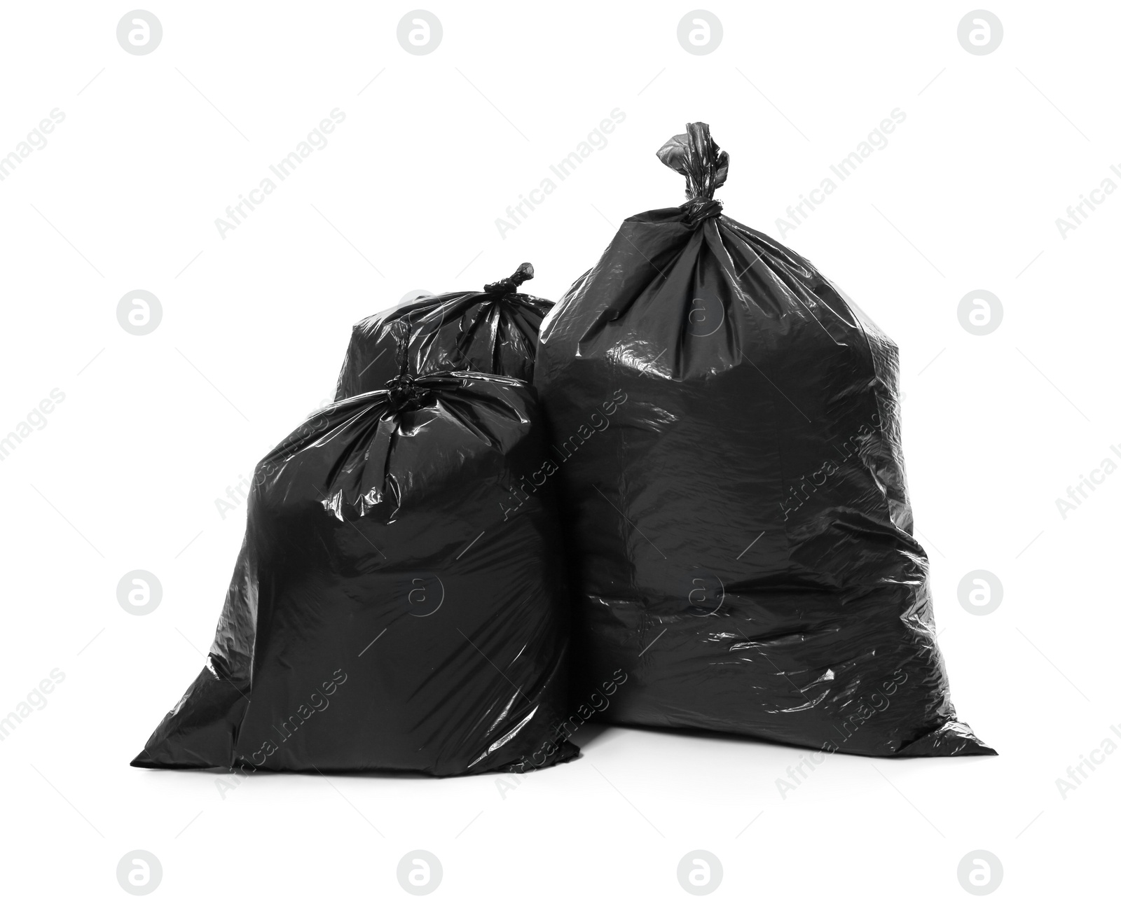 Photo of Trash bags full of garbage isolated on white