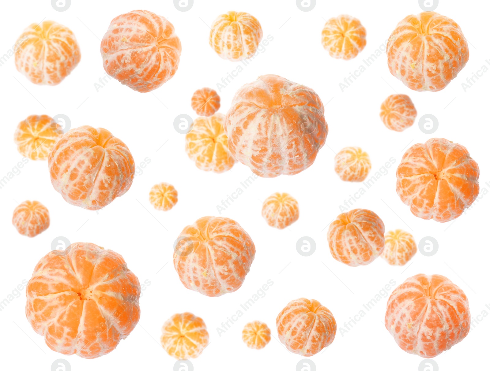 Image of Tasty peeled tangerines falling on white background