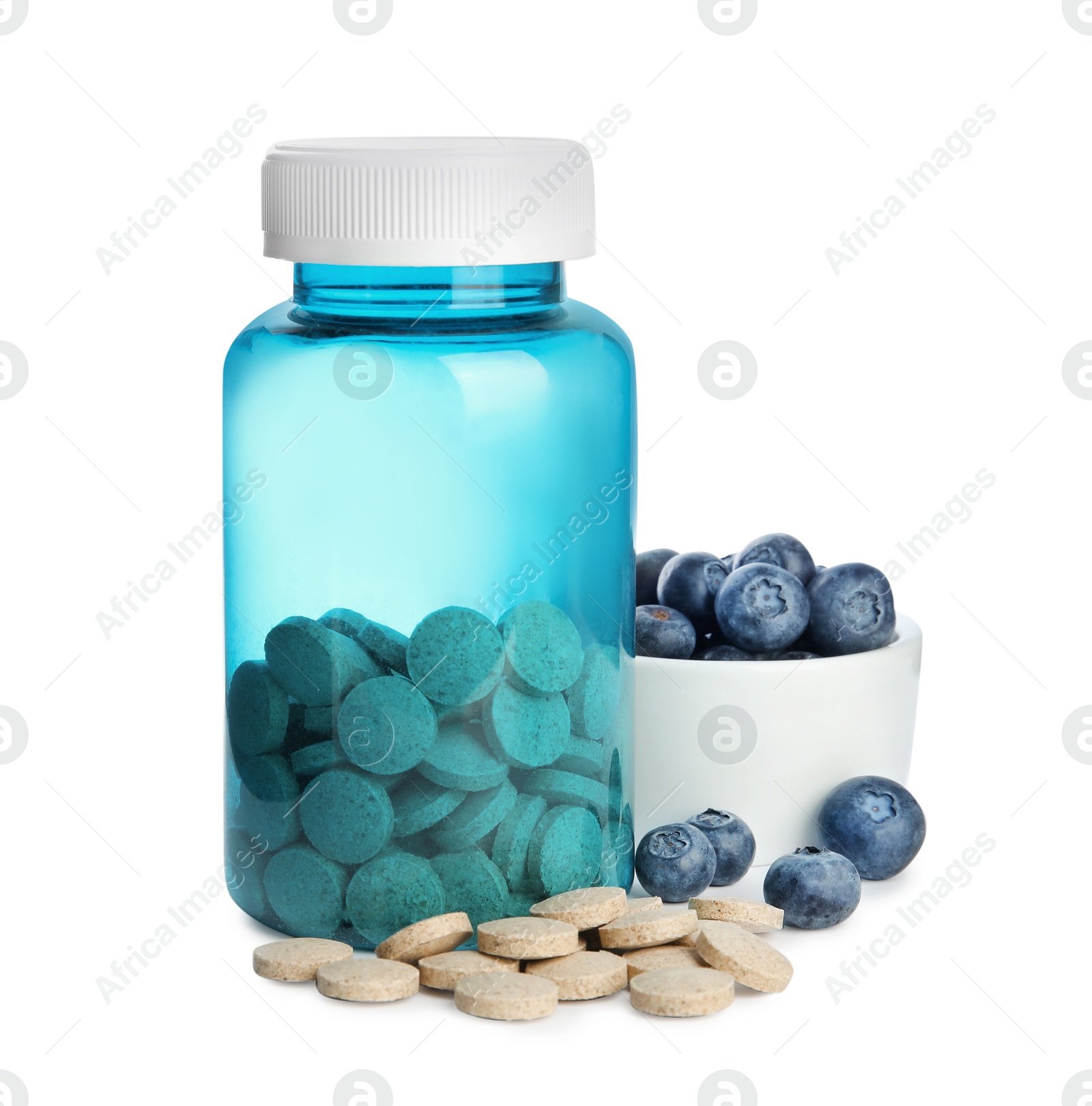 Photo of Bottle with vitamin pills and blueberries on white background