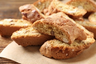 Photo of Traditional Italian almond biscuits (Cantucci) on table, closeup