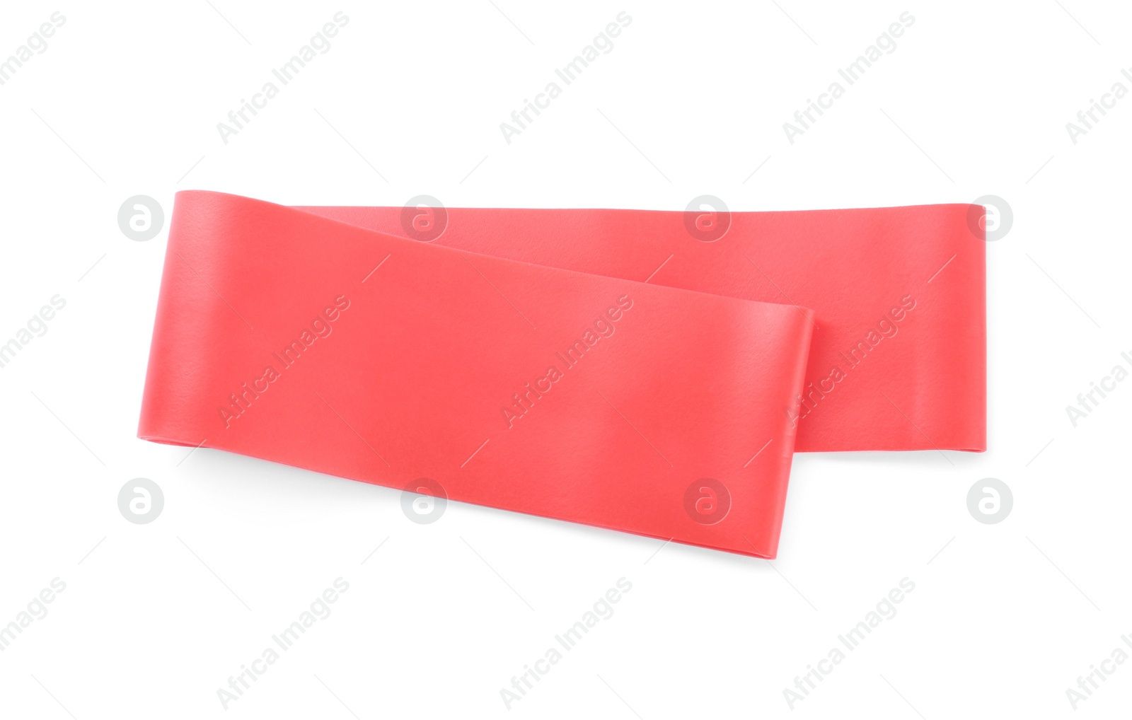 Photo of Red elastic resistance band isolated on white, top view. Fitness equipment