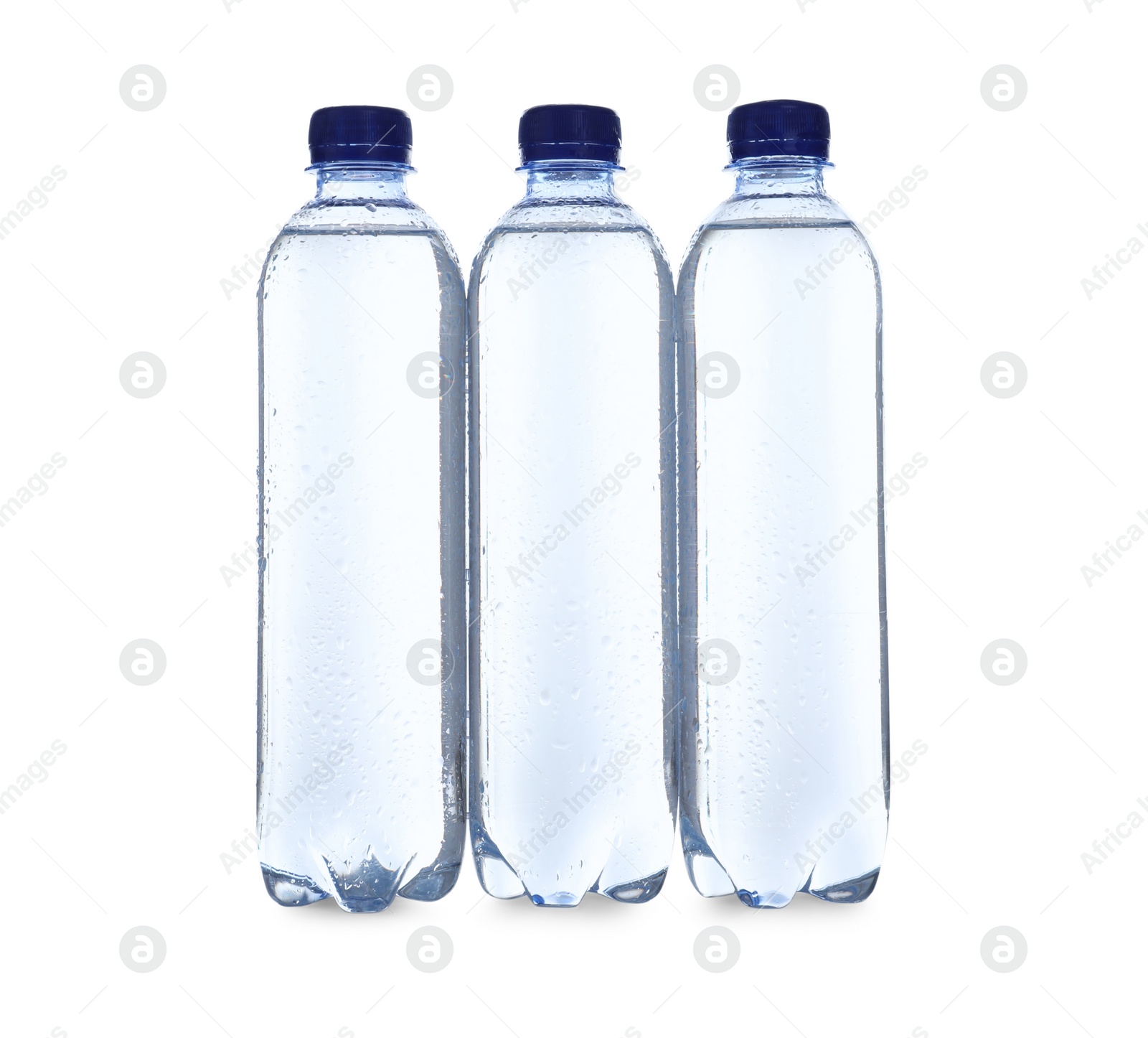 Photo of Plastic bottles with soda water on white background