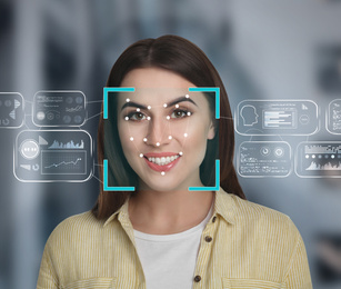 Facial recognition system. Woman with scanner frame on face and information