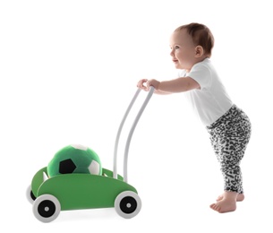 Cute baby with toy walker on white background