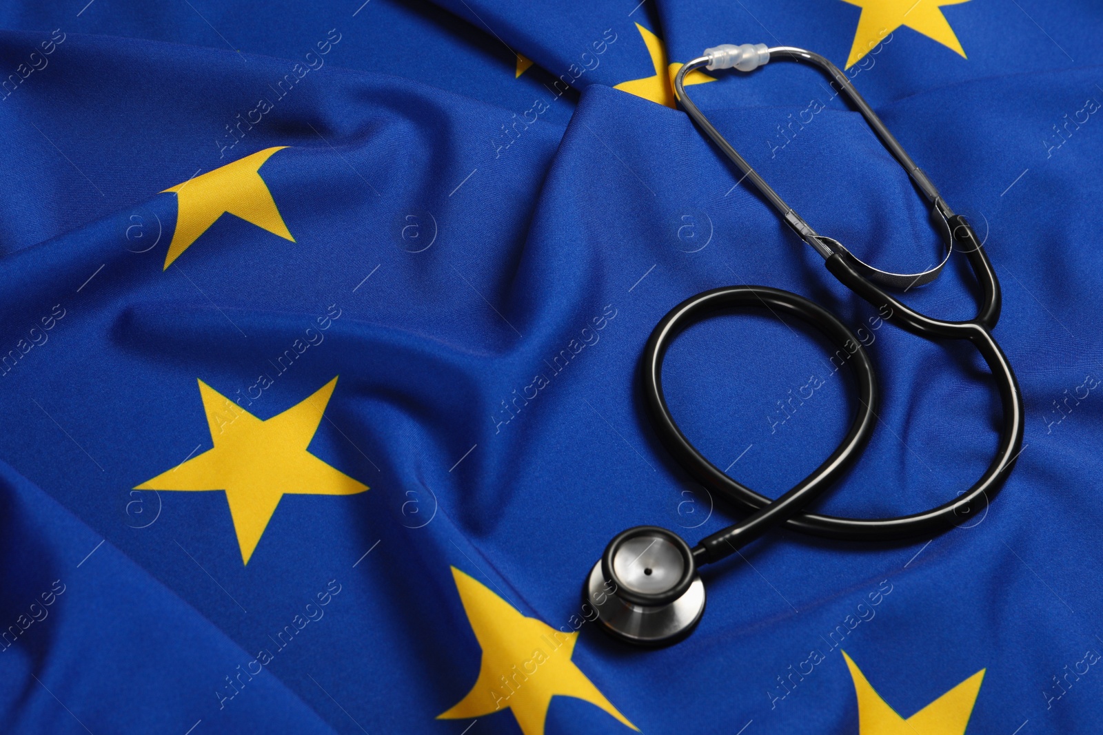Photo of Stethoscope on flag of European Union. Space for text