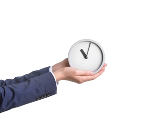 Businesswoman holding alarm clock on white background. Time concept