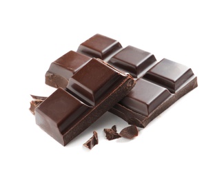 Pieces of tasty dark chocolate on white background