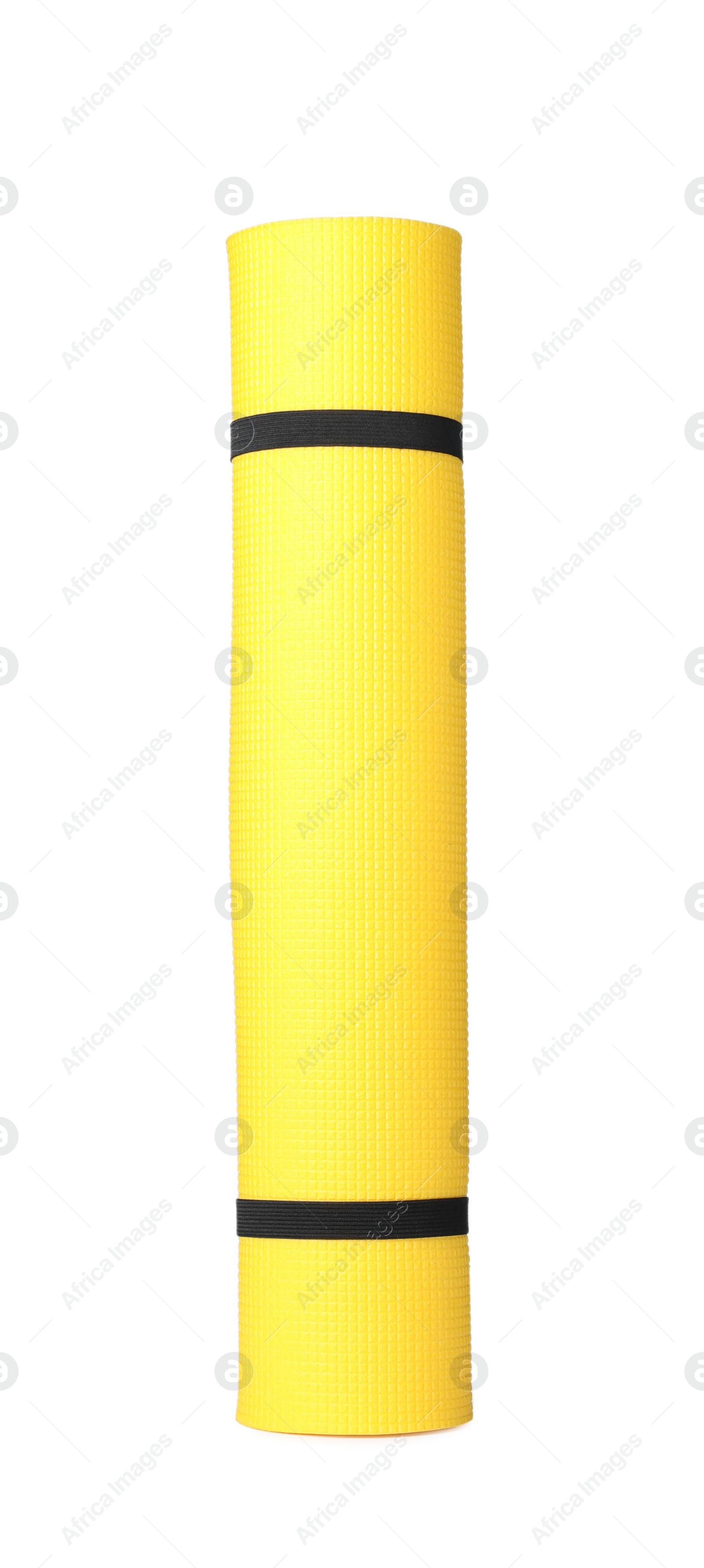 Photo of Rolled yellow camping mat isolated on white