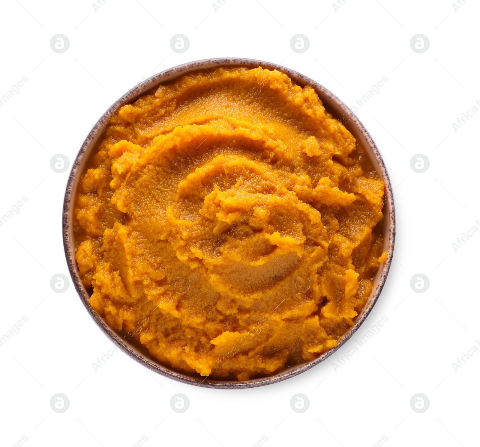 Photo of Delicious vegetable puree in bowl isolated on white, top view. Healthy food