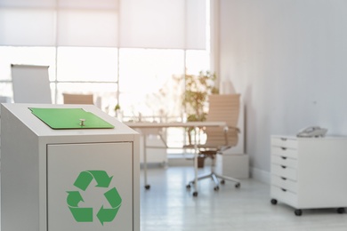 Trash bin in modern office, space for text. Waste recycling