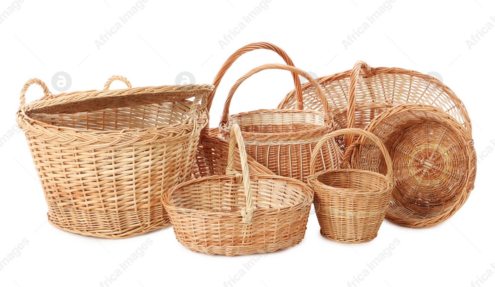 Photo of Many different wicker baskets on white background