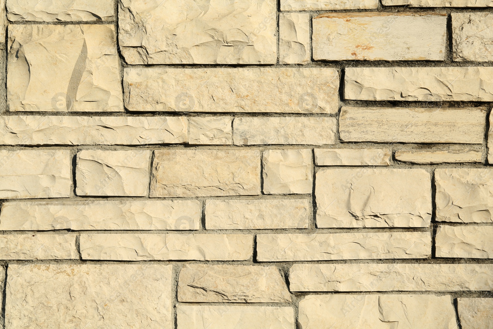 Photo of Texture of beautiful stone wall as background