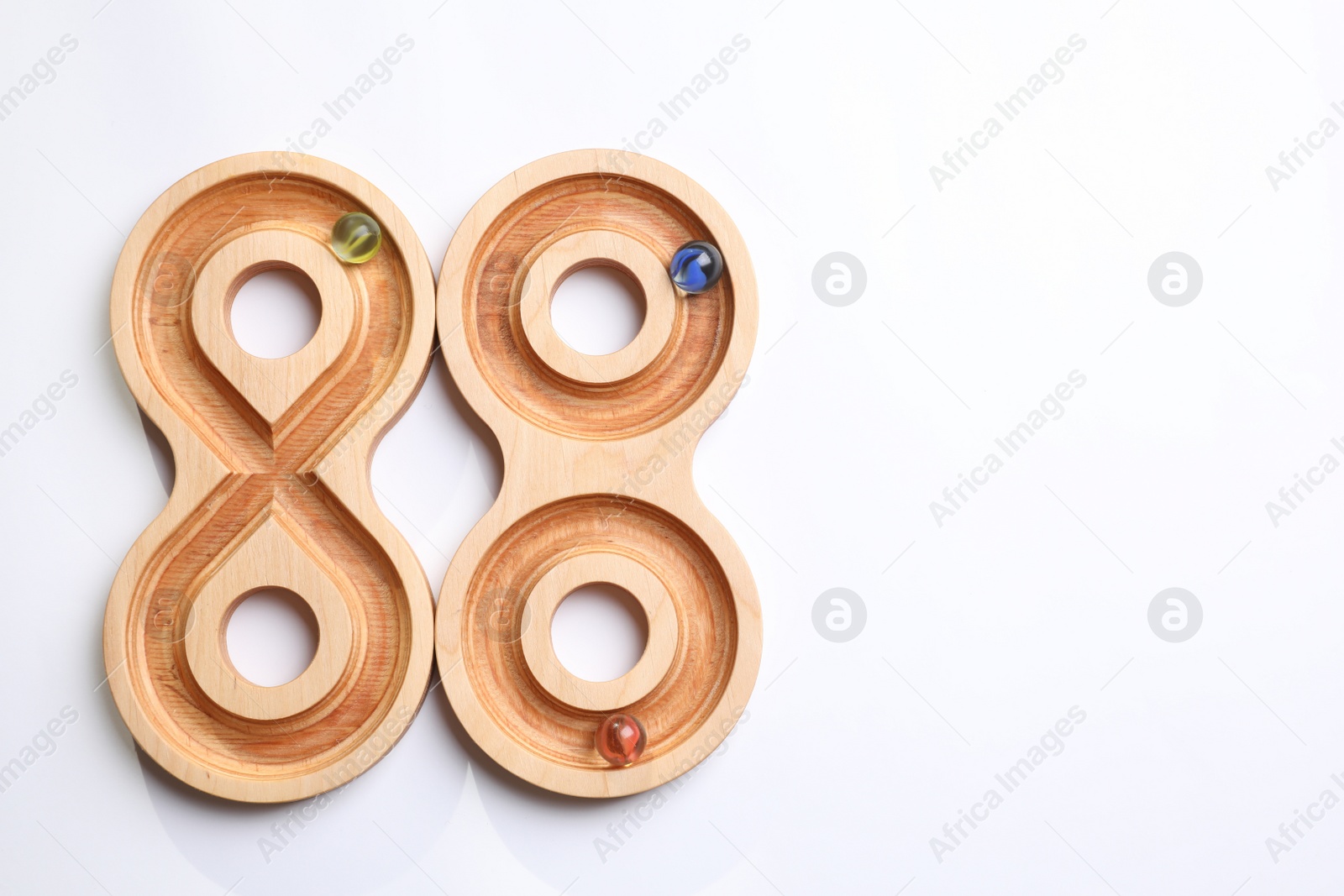 Photo of Labyrinth balance boards on white background, top view. Montessori toy