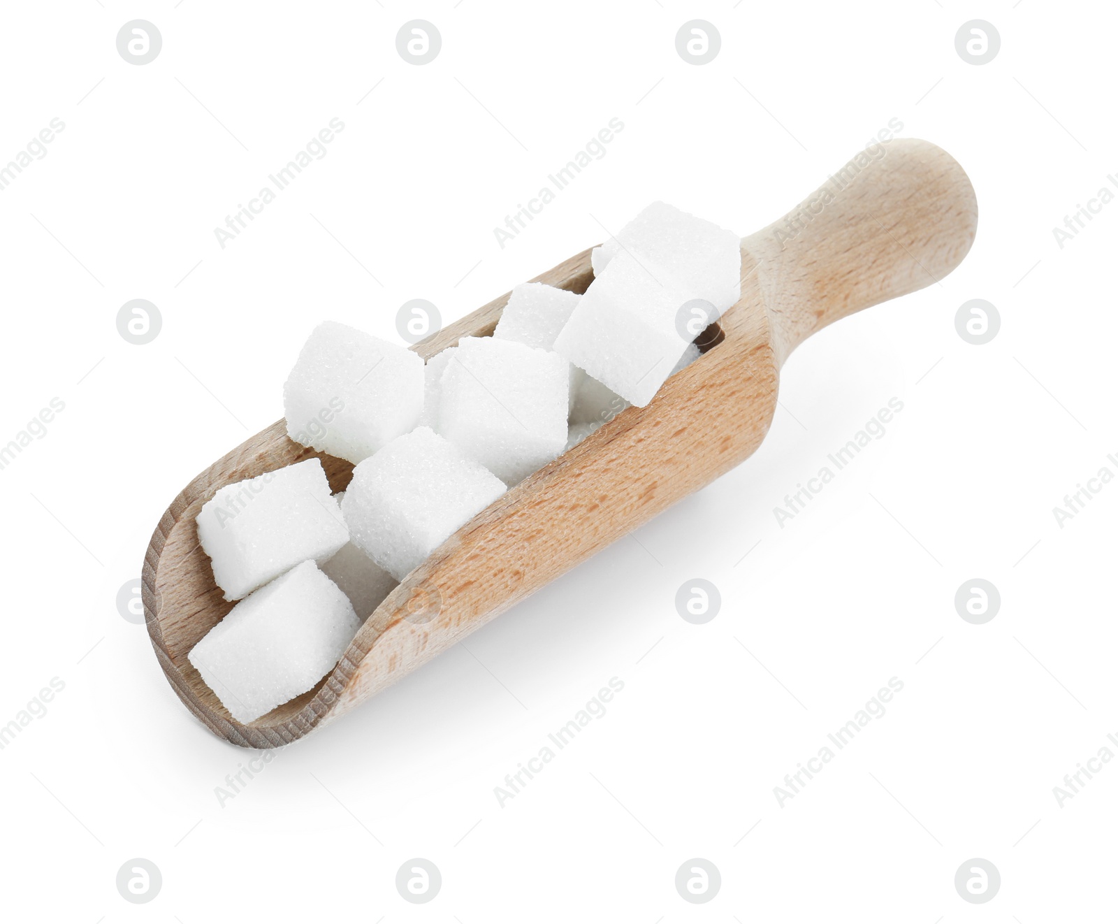 Photo of Sugar cubes in wooden scoop isolated on white