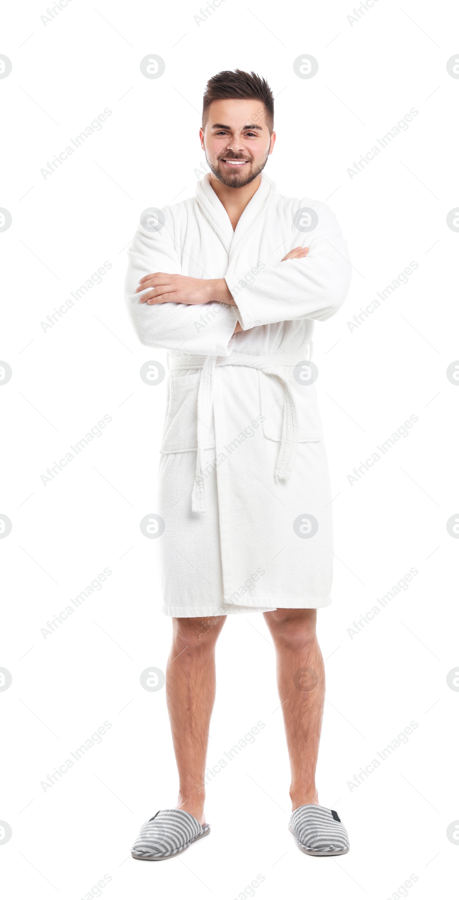 Photo of Handsome man wearing bathrobe on white background