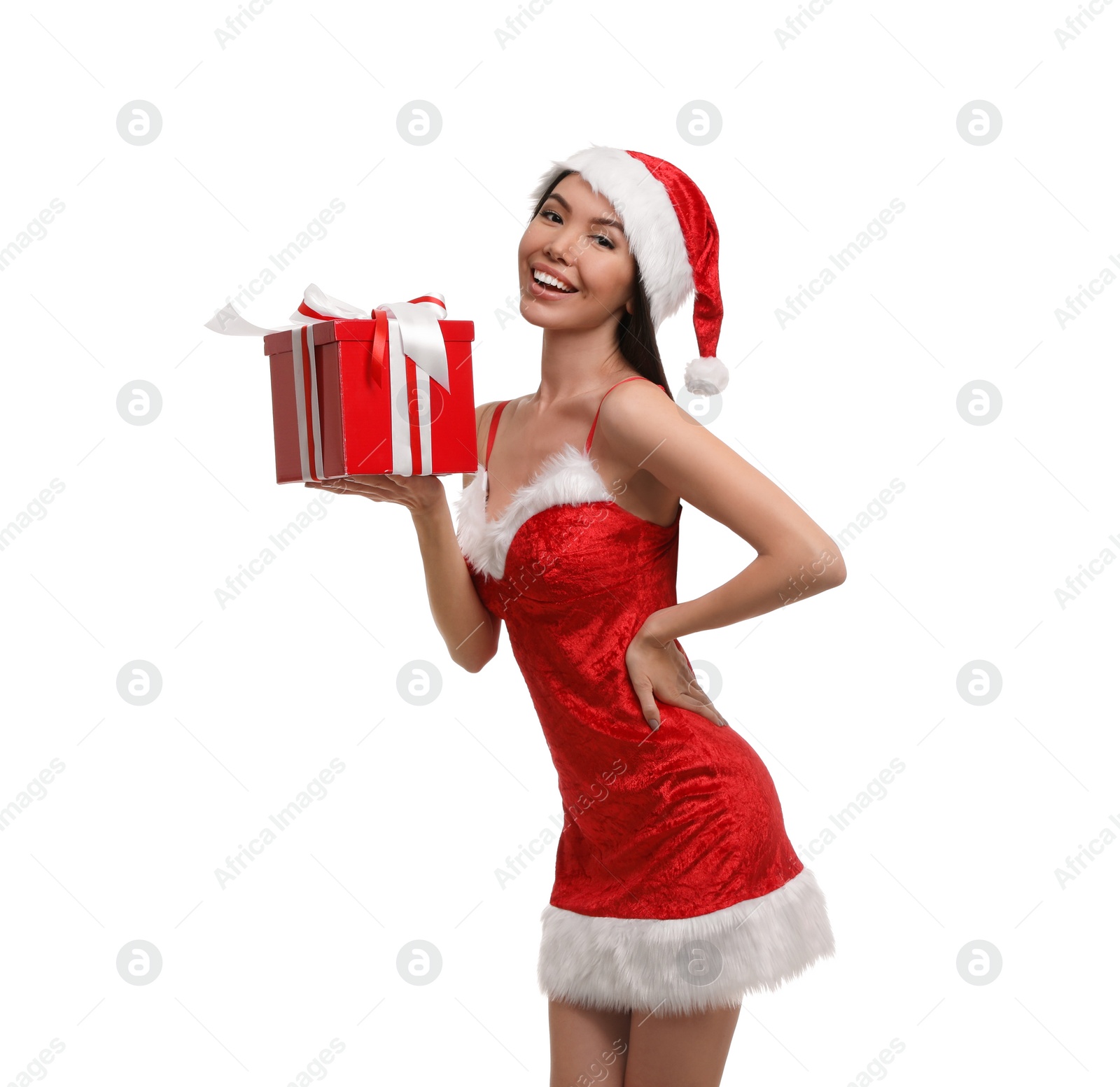 Photo of Beautiful Asian woman in Santa costume with Christmas gift on white background
