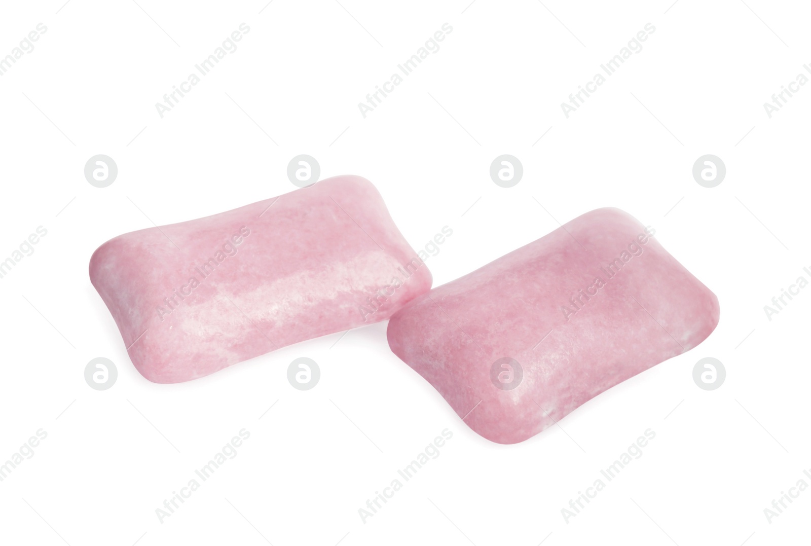 Photo of Tasty sweet chewing gums on white background