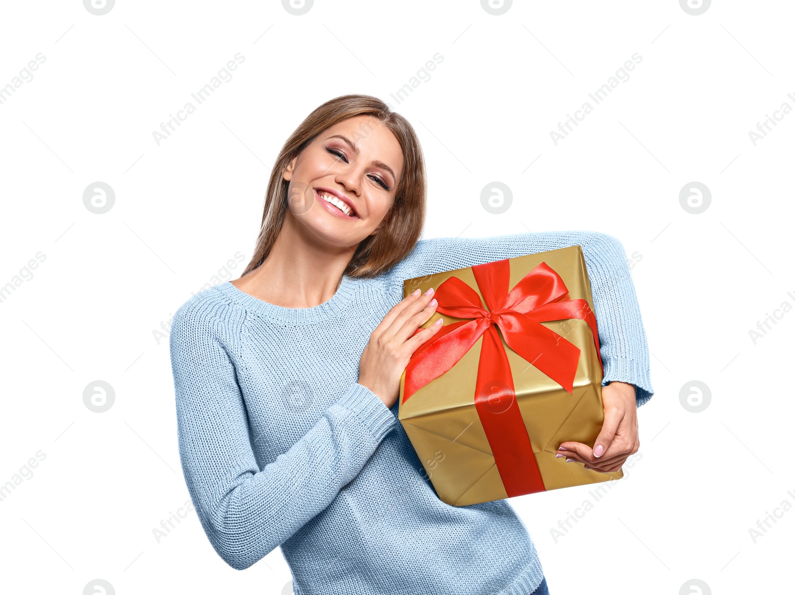 Photo of Young woman with Christmas gift on white background