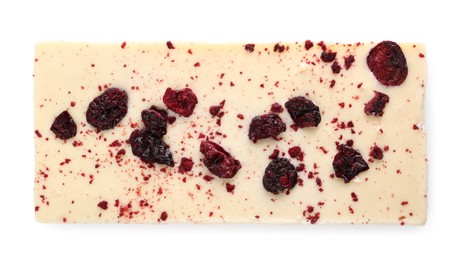 Chocolate bar with freeze dried cherries as background, top view