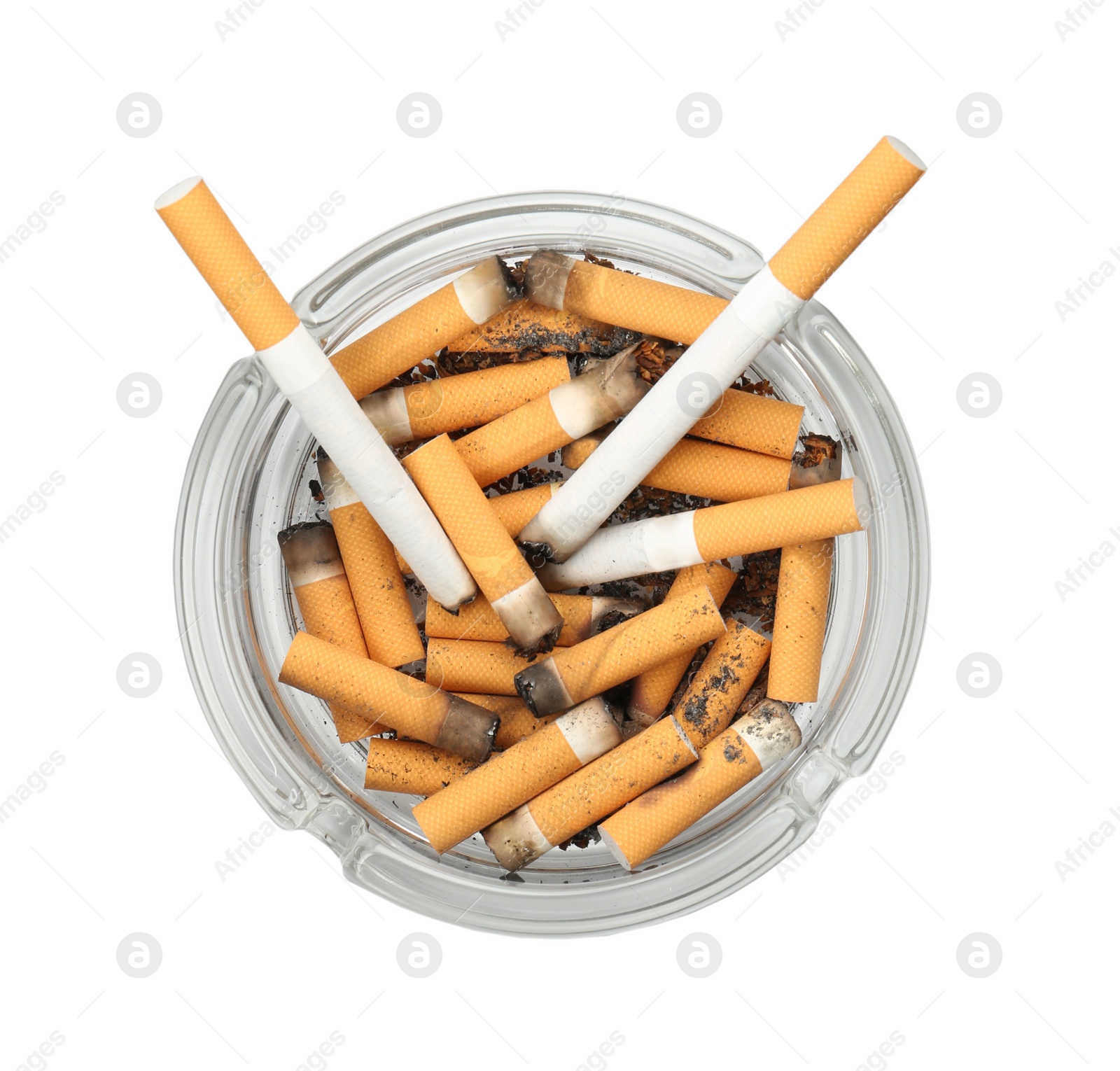 Photo of Glass ashtray full of cigarette stubs isolated on white, top view