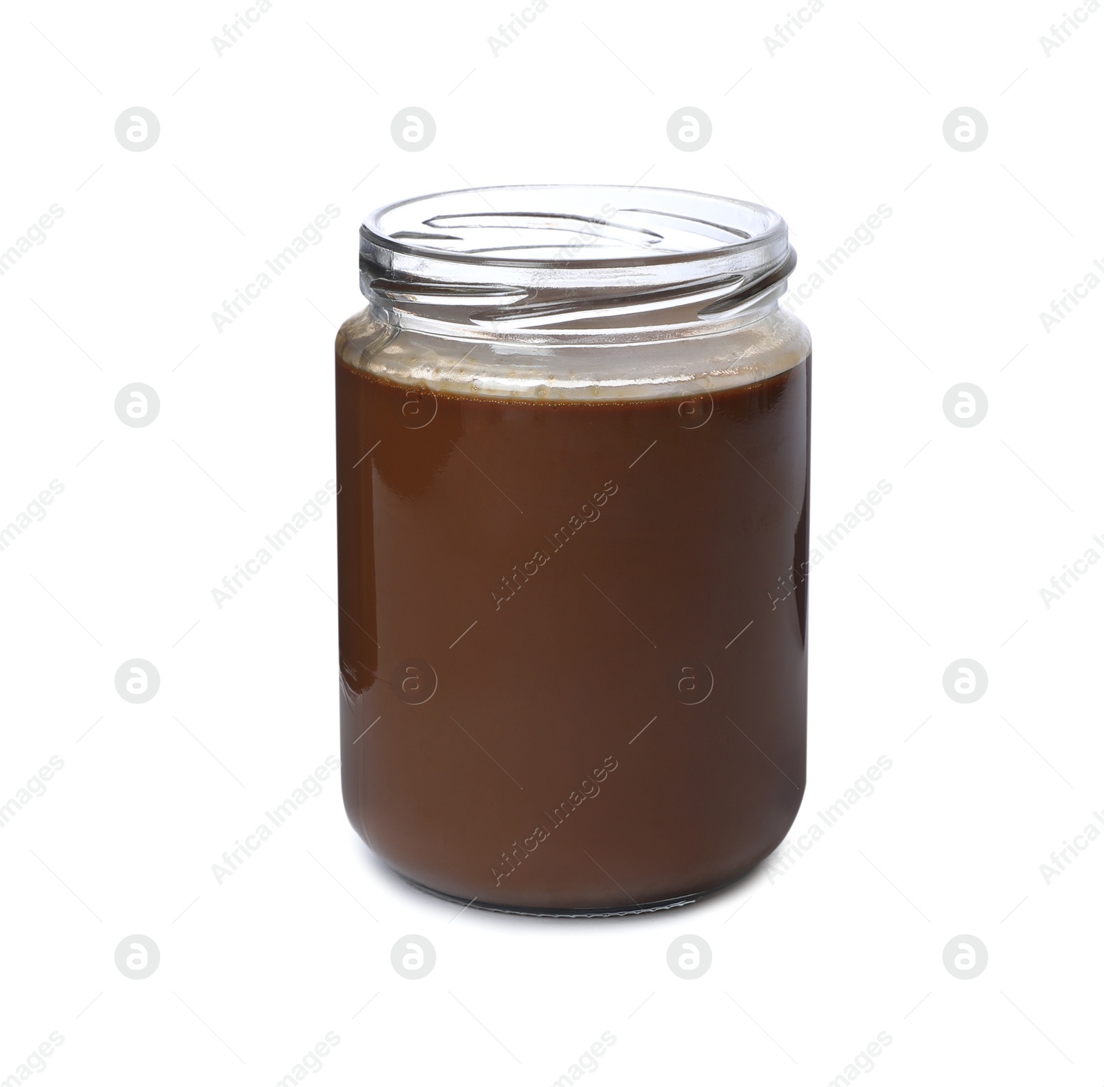 Photo of Jar of tasty boiled condensed milk isolated on white