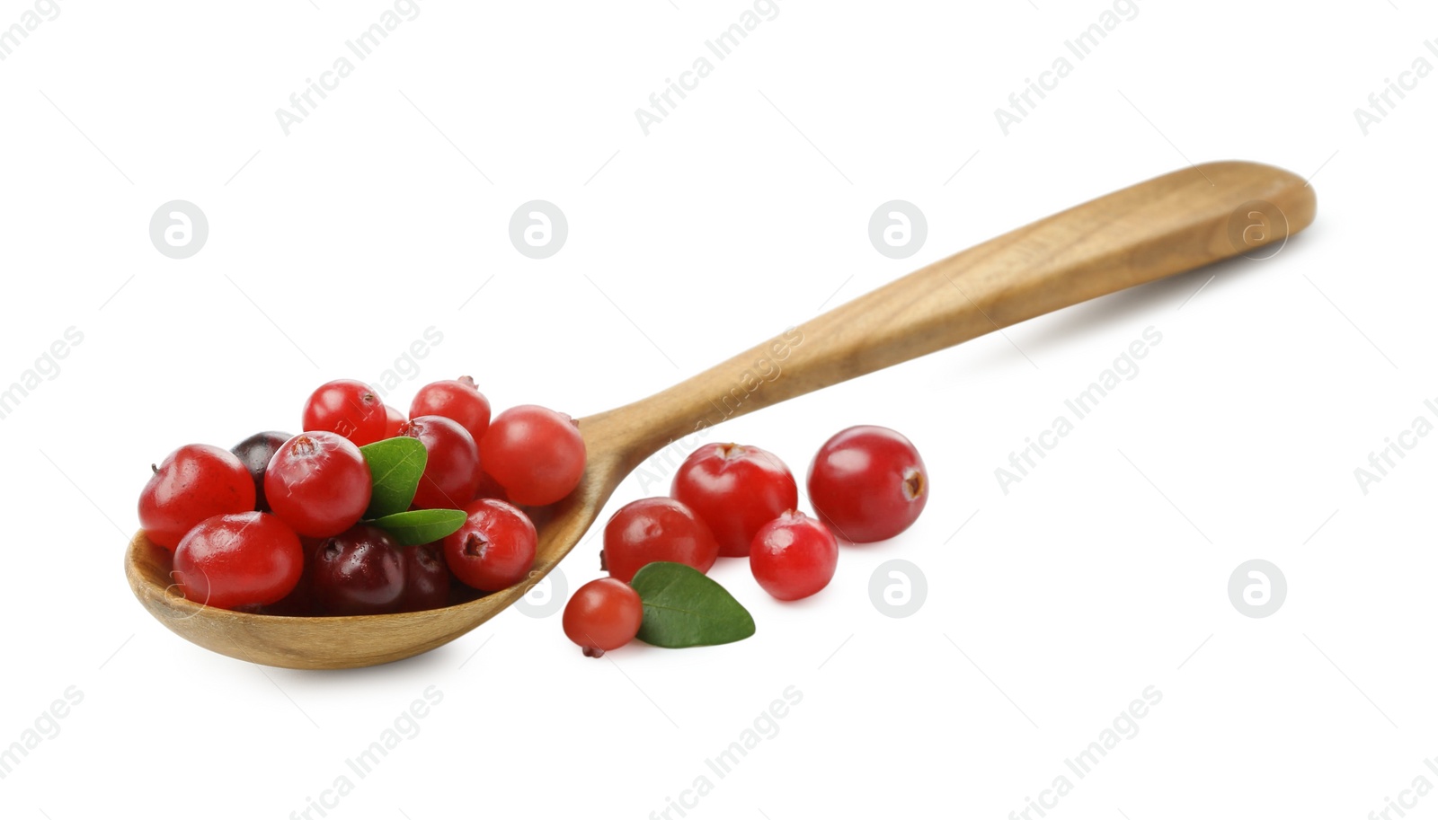 Photo of Wooden spoon and fresh ripe cranberries with leaves isolated on white