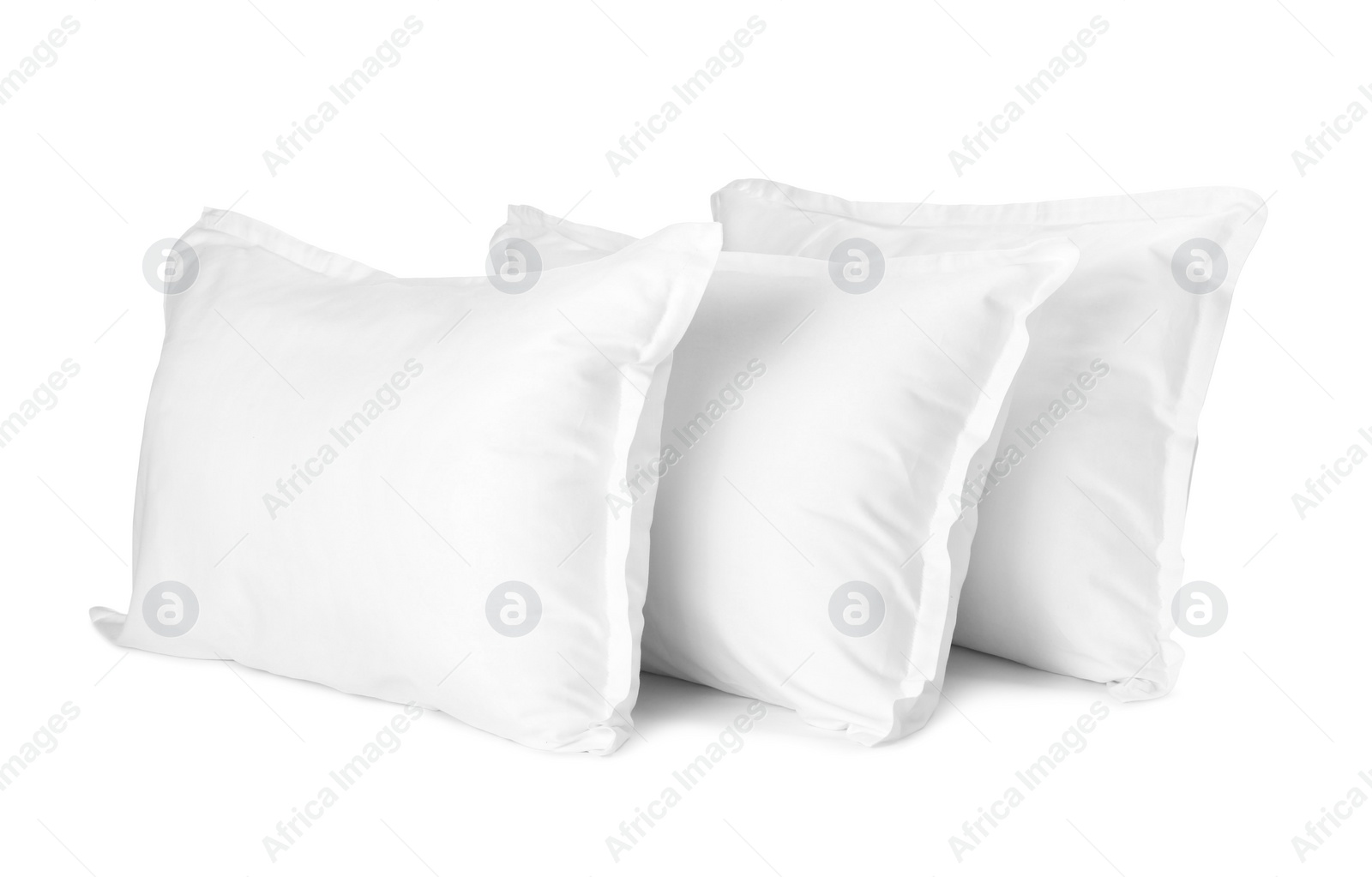 Photo of Many new soft pillows isolated on white