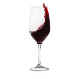 Image of Red wine splashing in glass on white background