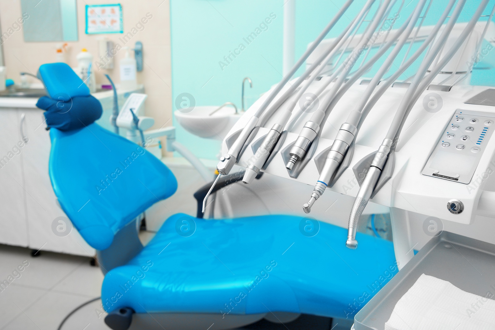 Photo of Set of professional instruments in dentist's office