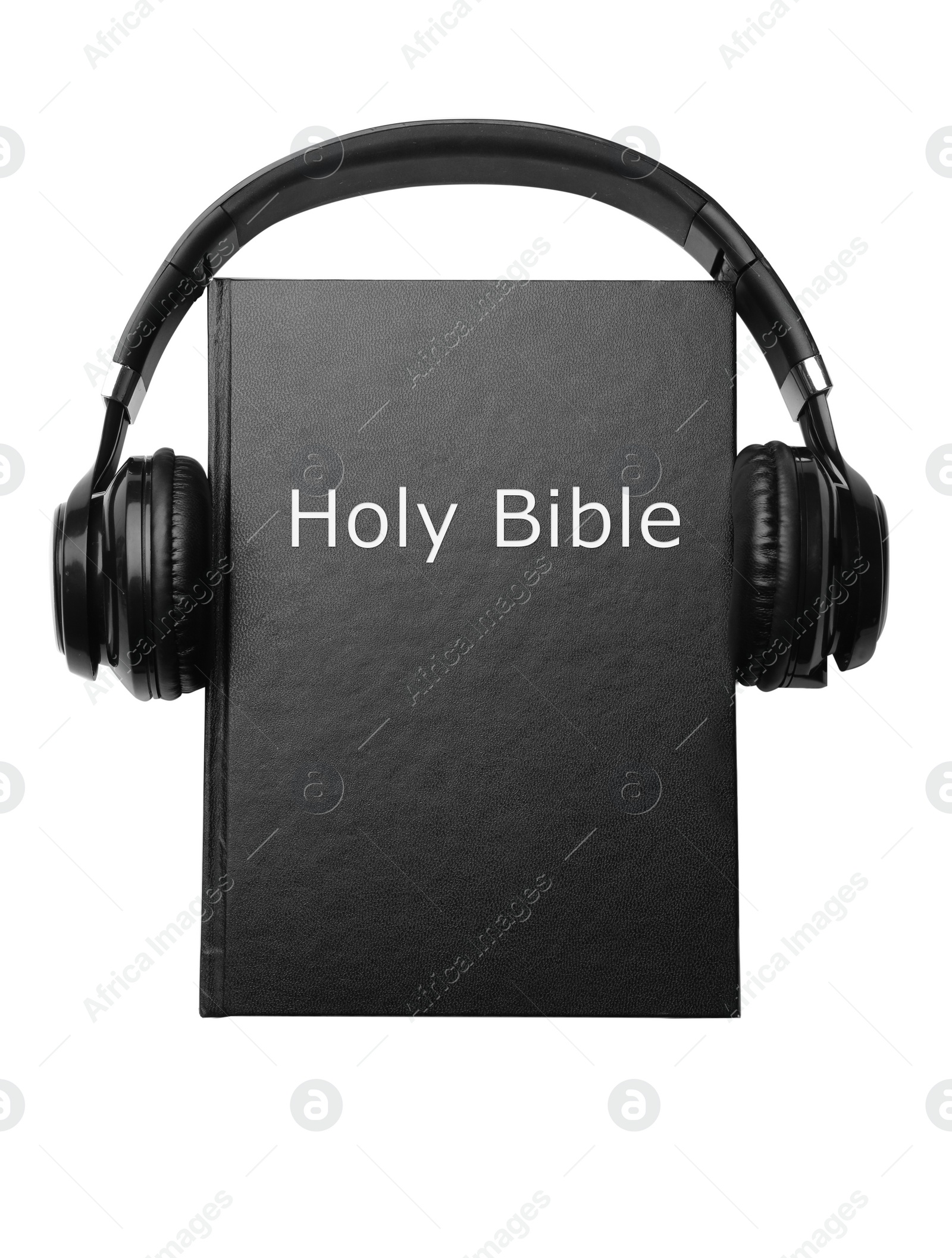 Photo of Bible and headphones on white background. Religious audiobook