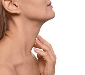 Woman touching her neck on white background, closeup