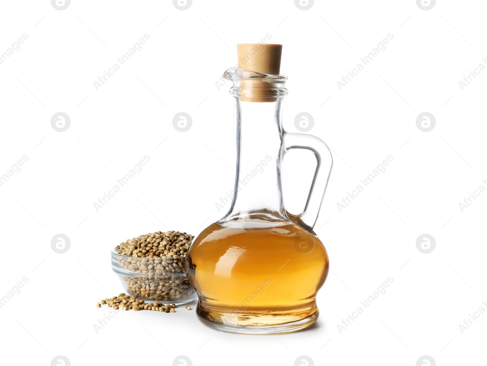 Photo of Jug with hemp oil and seeds on white background