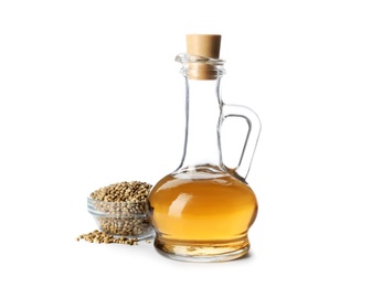 Photo of Jug with hemp oil and seeds on white background