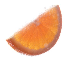 Slice of orange in sparkling water on white background. Citrus soda