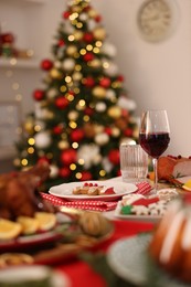 Photo of Festive dinner served on table indoors. Christmas Eve celebration