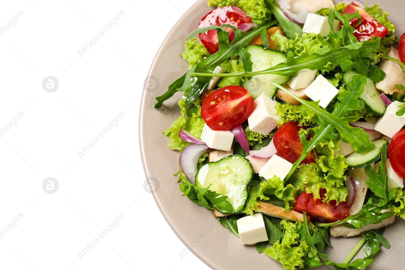 Photo of Delicious salad with meat, arugula and vegetables isolated on white, top view