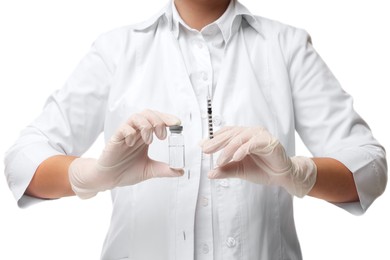 Doctor holding medical syringe and glass vial on white background, closeup