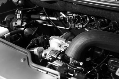 Photo of Closeup view of engine bay in modern car