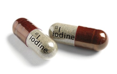 Image of Iodine capsules on white background. Mineral element