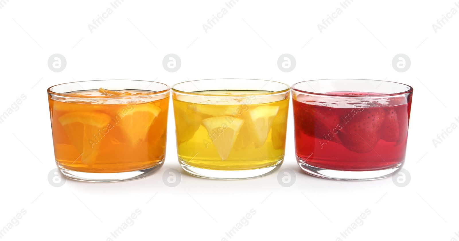 Photo of Tasty jelly desserts in glasses on white background