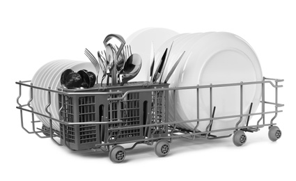 Rack with clean dishes and utensils on white background