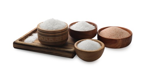 Different types of natural salt in wooden bowls isolated on white