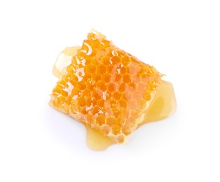 Photo of Natural honeycomb with tasty honey isolated on white, top view