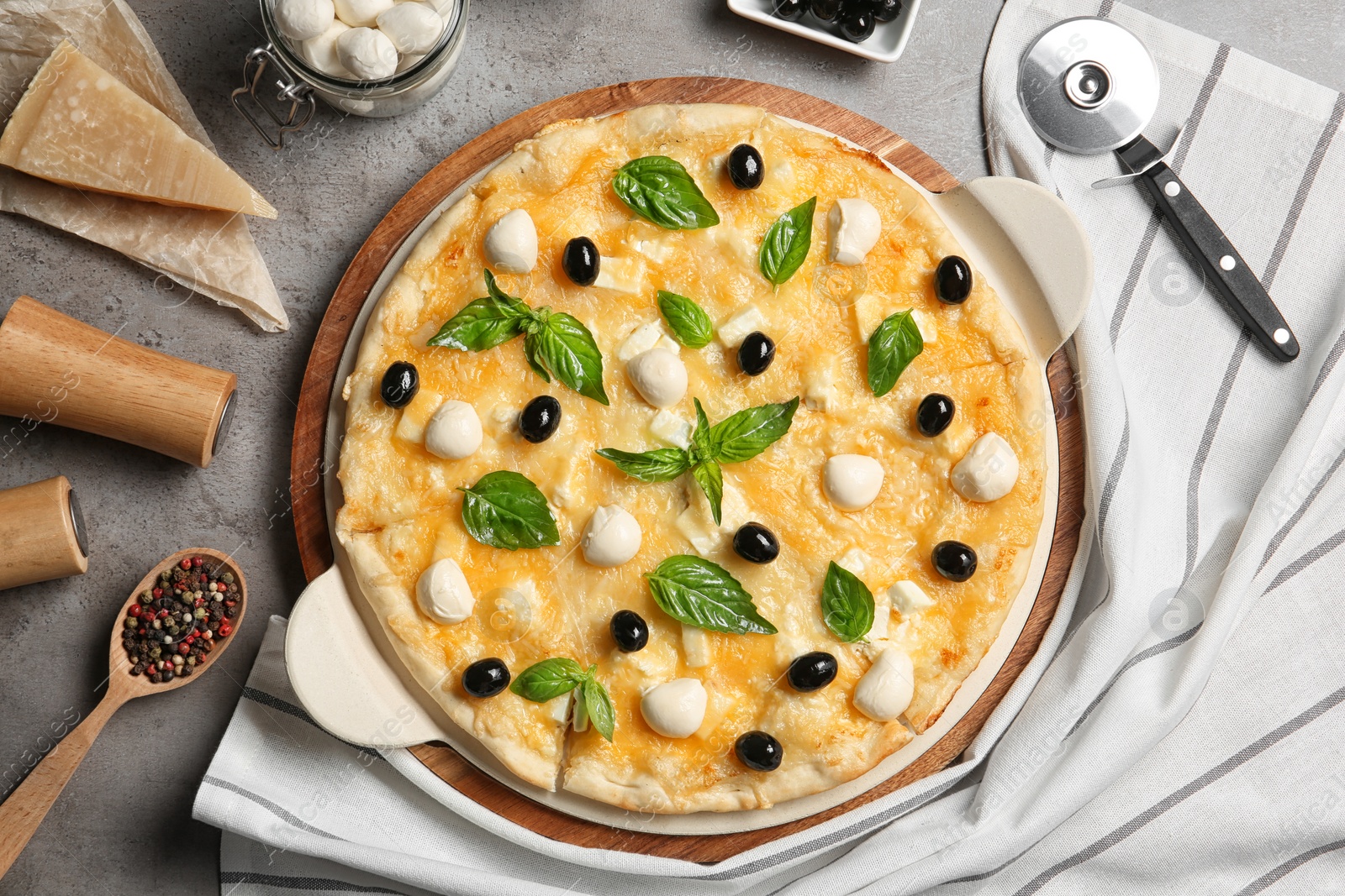 Photo of Flat lay composition with tasty homemade pizza on table