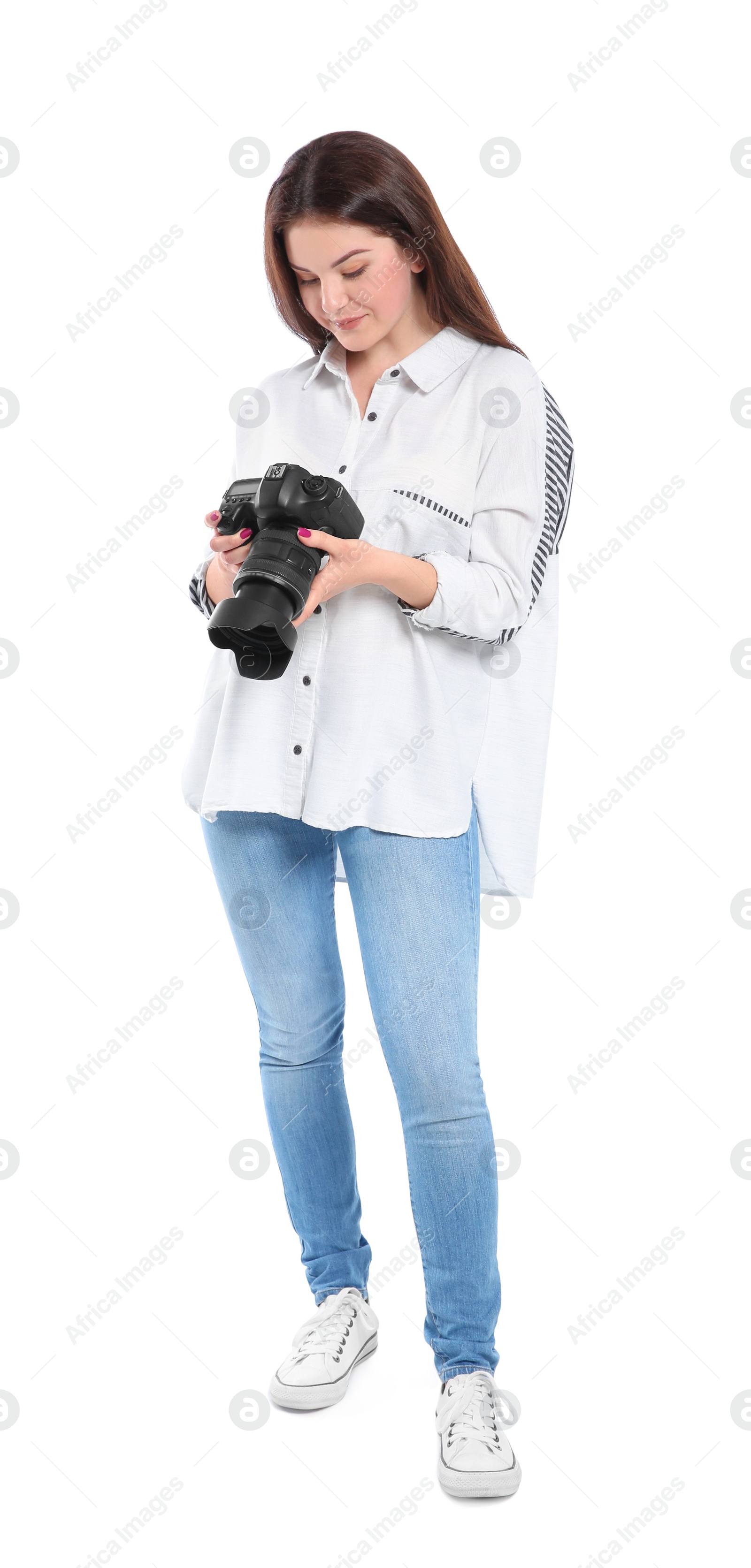 Photo of Female photographer with professional camera on white background