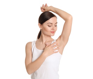 Young woman showing smooth silky skin after epilation on white background