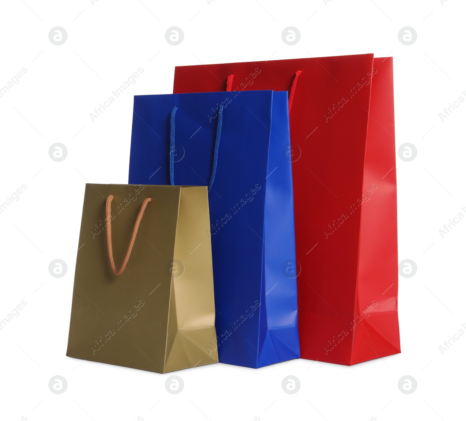 Photo of Colorful paper shopping bags isolated on white